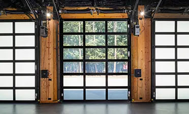 C-Power™ enabled Click-to-Conceal™ panels in Clear/White Opaque laminated glass in a black anodized aluminum frame