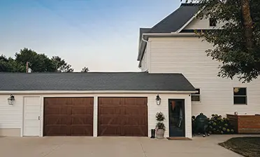 Bridgeport Inlay garage door in Walnut finish
