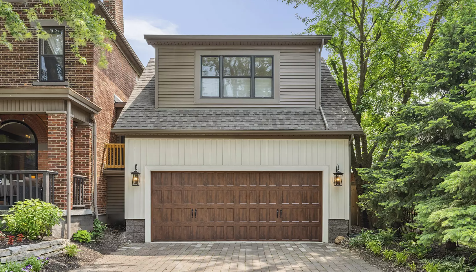 Bridgeport™ Steel garage door with narrow recessed panels in Ultra-Grain® Dark Finish