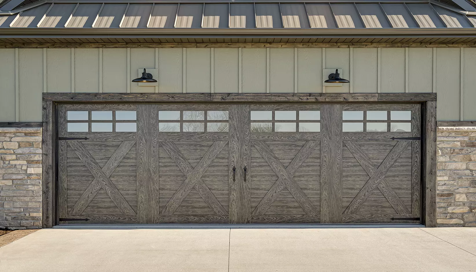 Canyon Ridge 4-Layer garage door in Design 21 with SQ23 windows in Ultra-Grain® Cypress Slate Finish