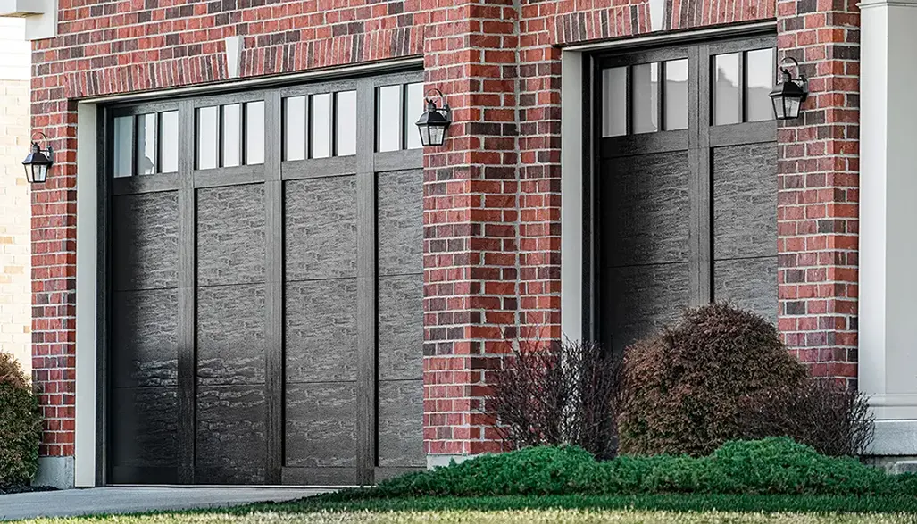 Canyon Ridge Elements garage door in Design 11 with REC13 windows in Black