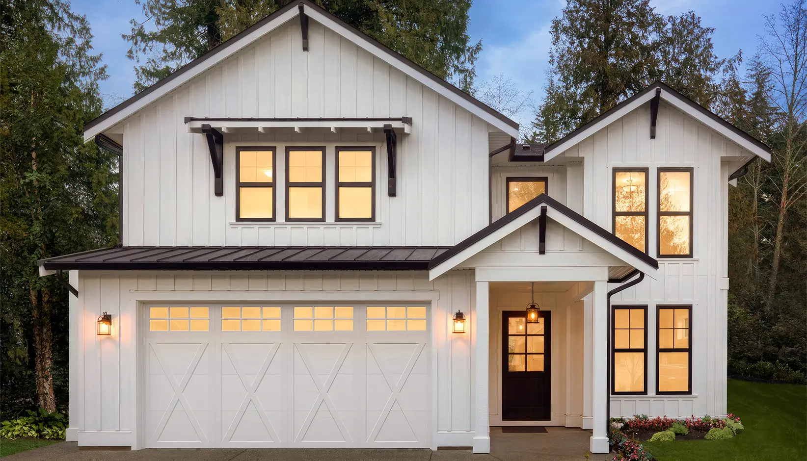 Coachman garage door in Design 21 with SQ23 windows in white