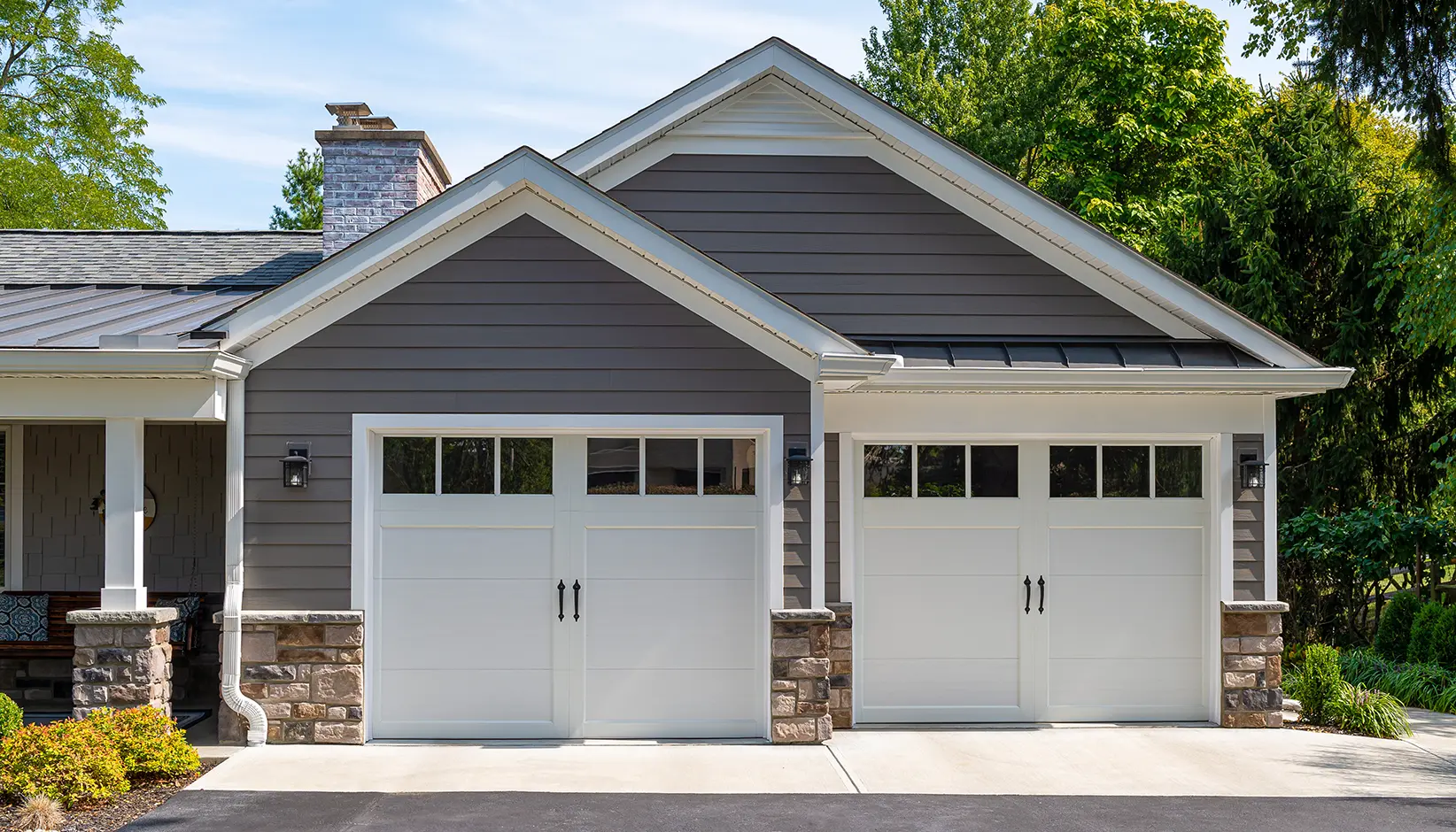 Coachman® garage door in Design 11 with REC 13 windows in white