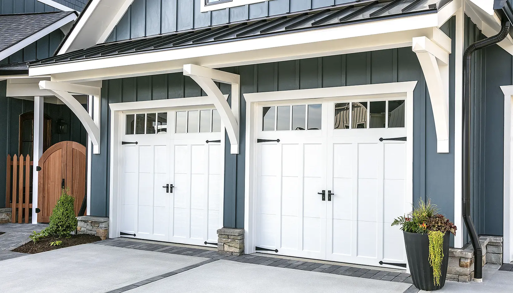 Coachman® garage door in Design 13 with REC14 windows in white