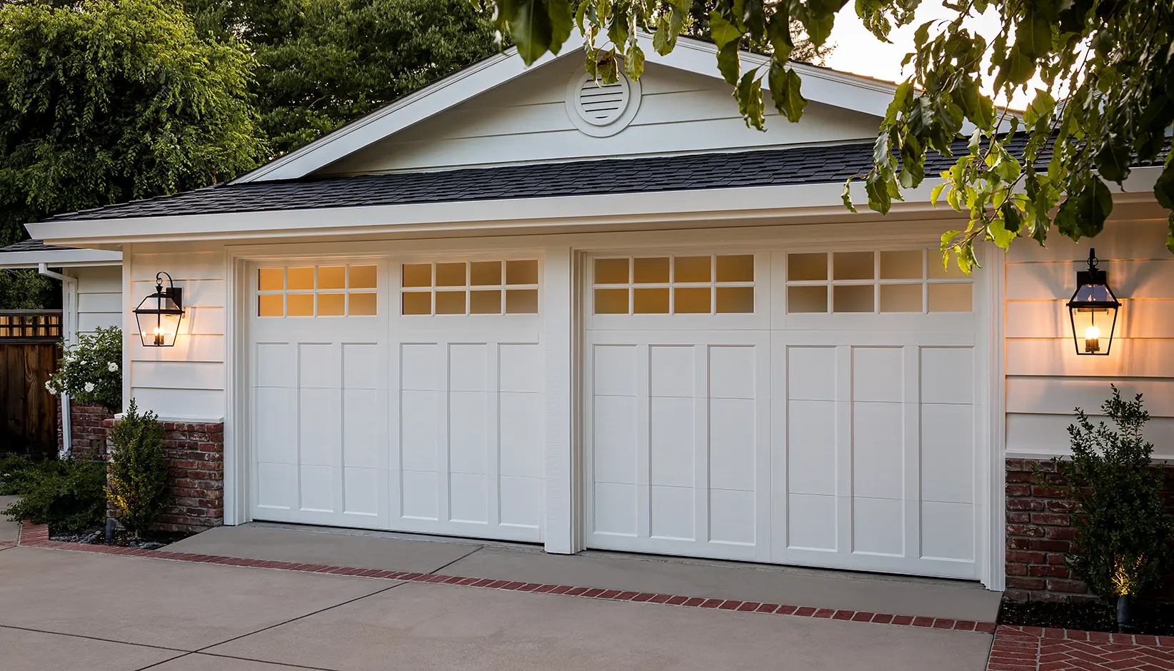Coachman garage door in Design 13 with SQ24 windows in White