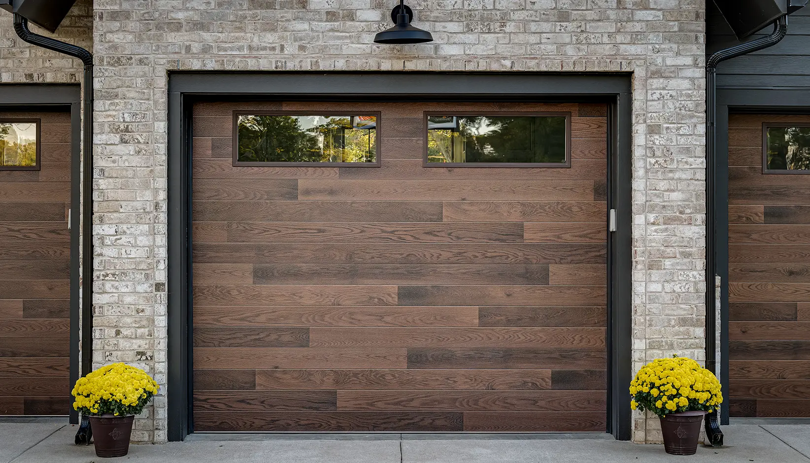 Modern Steel Ultra-Grain Plank garage door in Kona