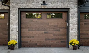 Modern Steel Ultra-Grain Plank garage door in Kona