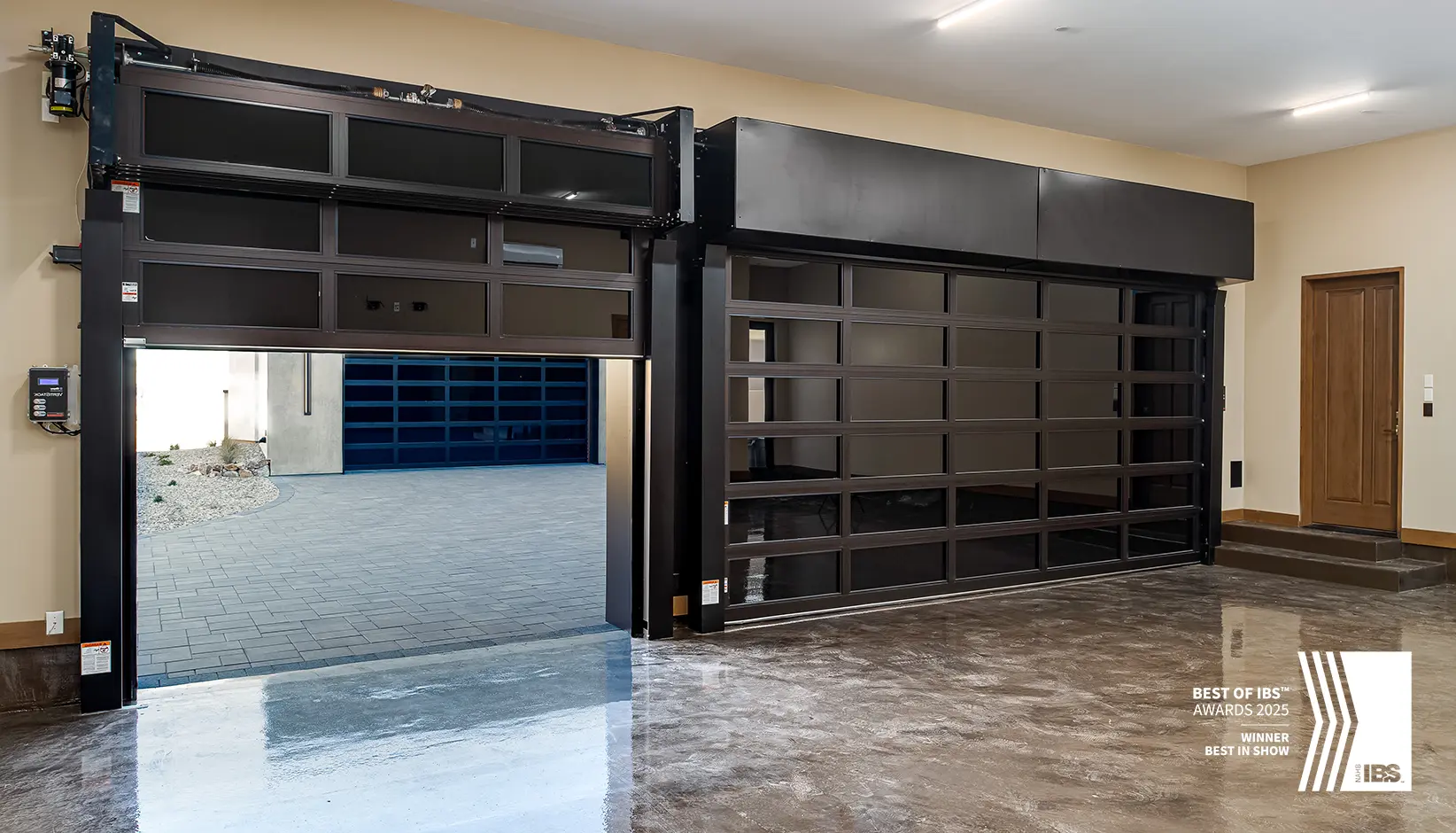 VertiStack Avante garage door with bronze anodized frame