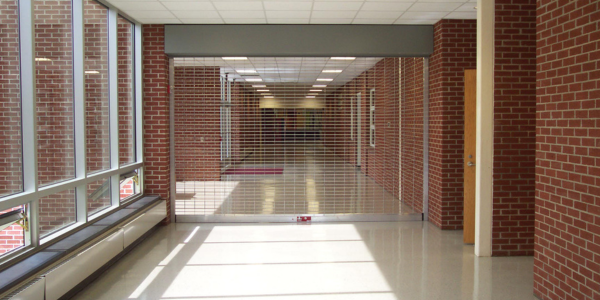clopay CrossingGard with ThreatProtect Grille security grille in hallway