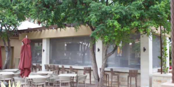 curb appeal exterior of restaurant with rolling grilles