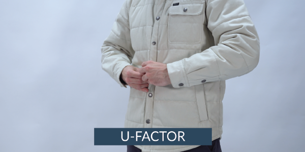 U-Factor person buttoning coat representing u-factor