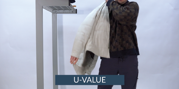 U-Value person putting on coat representing U-value